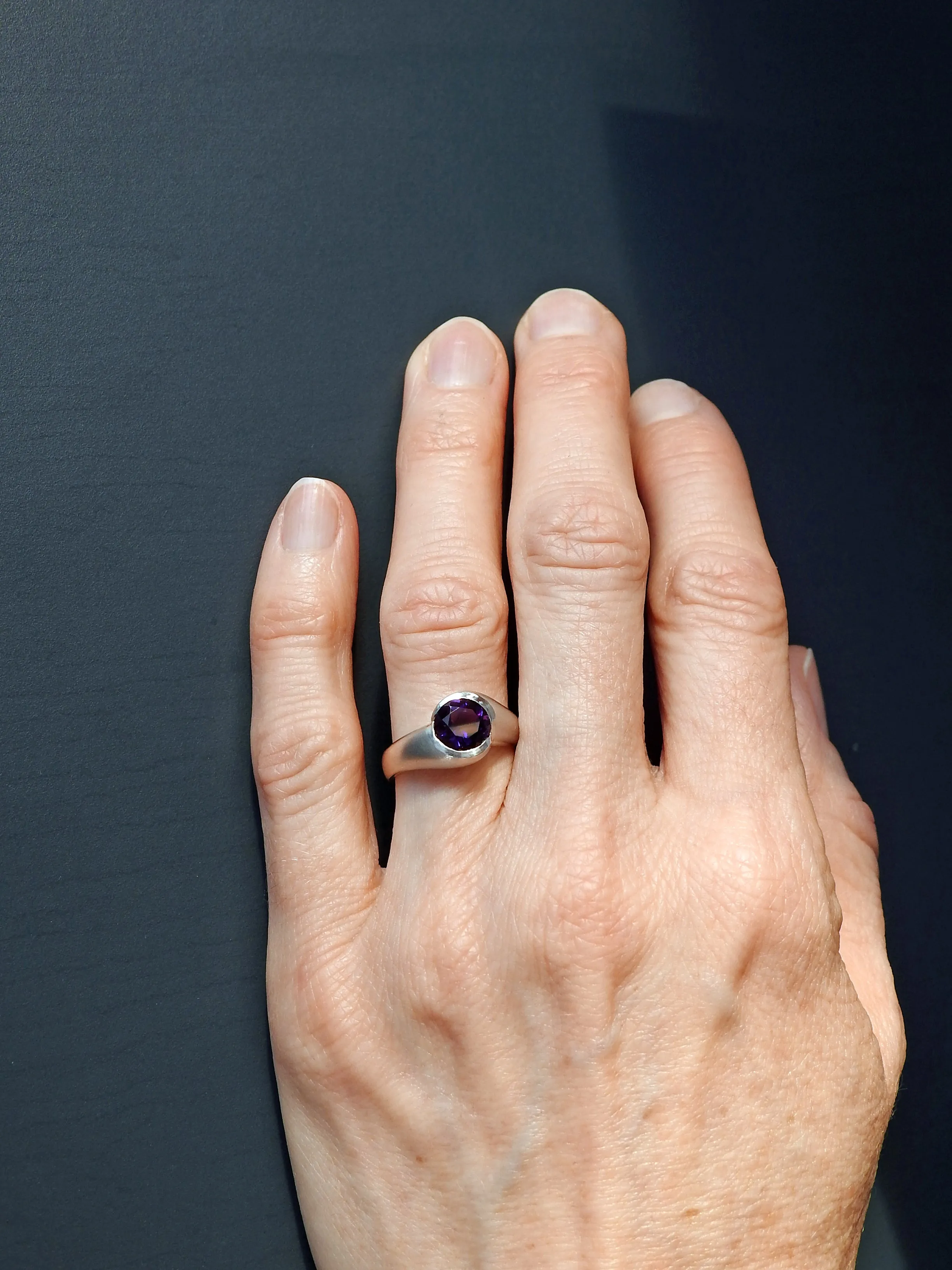 Rounded wrap bezel ring with Amethyst