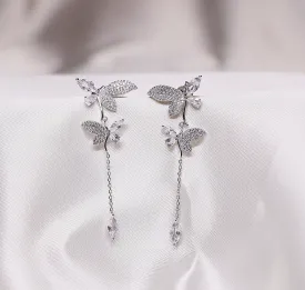 Silver butterfly dangle earrings